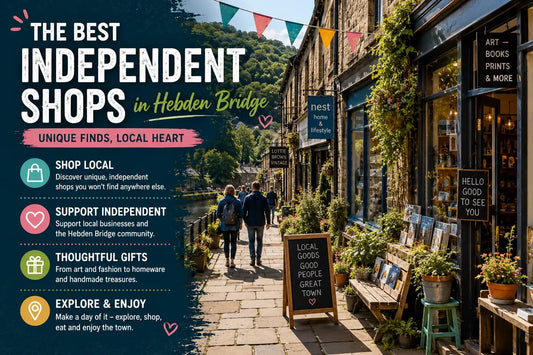 Independent shops in Hebden Bridge with sunny stone streets, shopfronts, signs, bunting and people browsing local businesses.